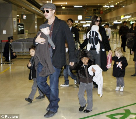 Angelina Jolie And Brad Pitt Family Pictures. angelina-jolie-rad-pitt-adopt